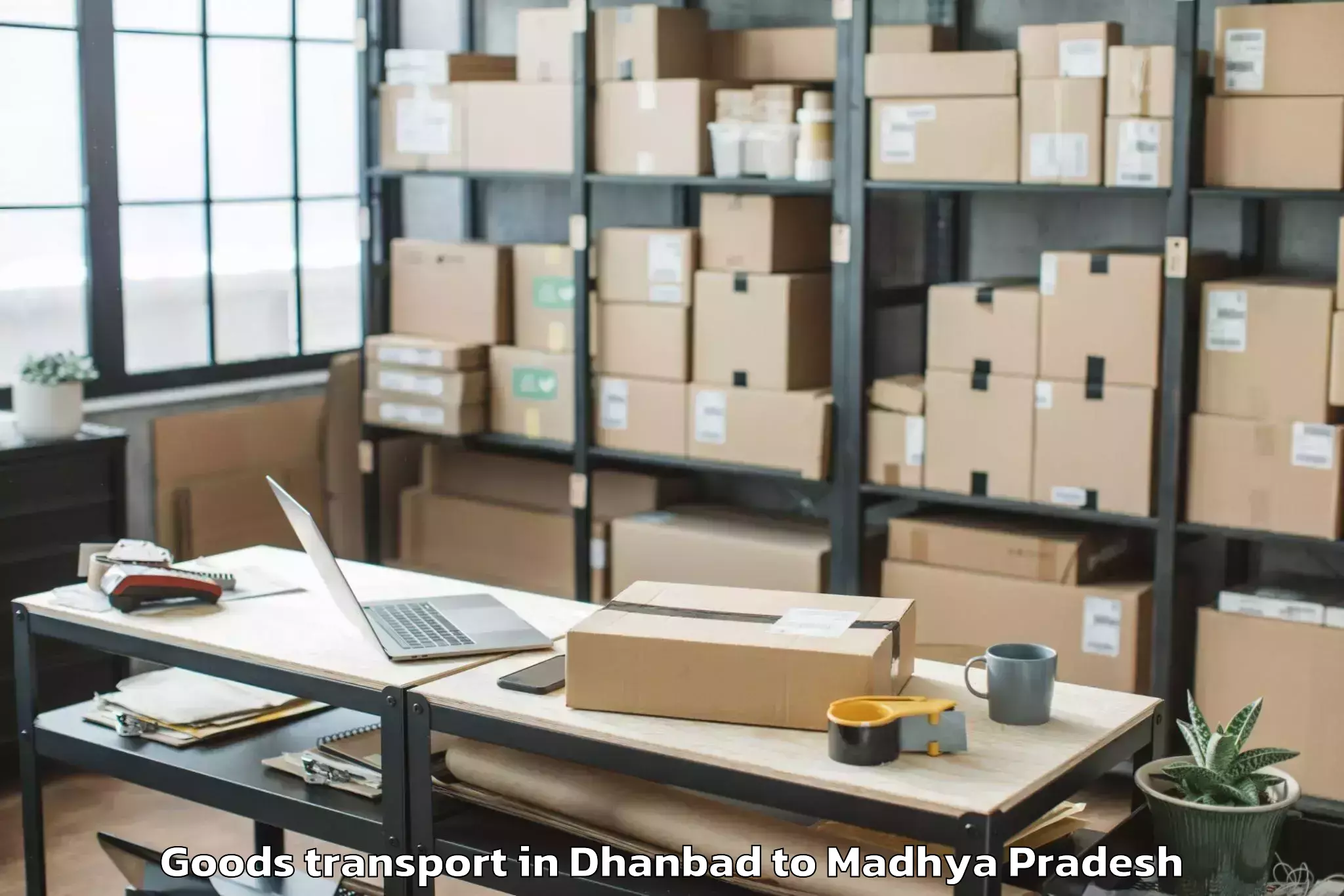 Book Dhanbad to Barnagar Pt Goods Transport Online